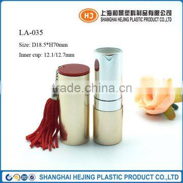 Delicate fringed metal lipstick tube