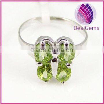 Butterfly Ring, sterling silver with peridot (natural), 4 and 4x5mm faceted round / oval