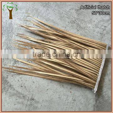 Artificial thatch with fire retardant for outdoor using