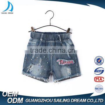 China Apparel Factory Elastic Ribbon Waistband Kids Printed Shorts Jeans With Hole photo-2
