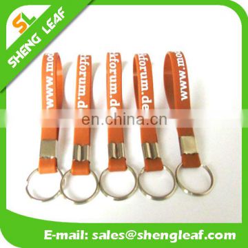 2017 cheap hot selling custom silicone bracelet keychain with metal keyring