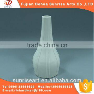 White ceramic vase used for flower arranging