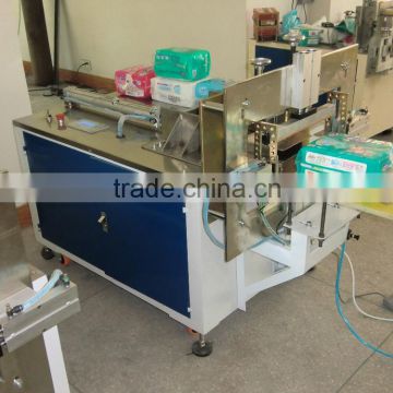 China hot sale semi-automatic diaper wrapper