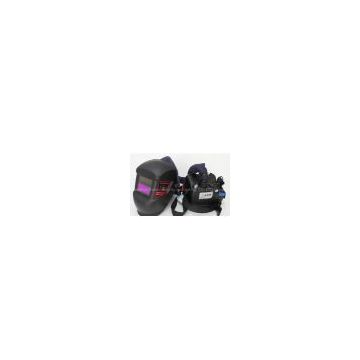 Welding helmet with respirator