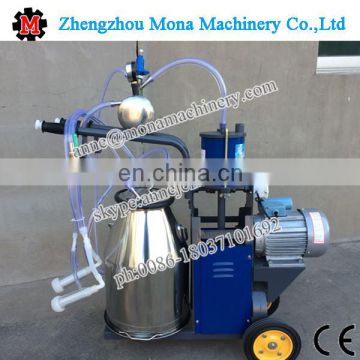 Electric motor driven single bucket portable cow/goat milking machine