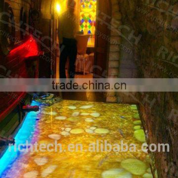 Interactive floor and projector for outdoor advertising with high-tech for advertising