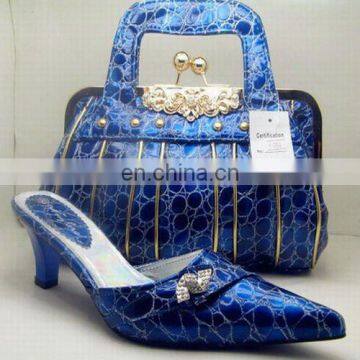 Beautiful blue patent low heel shoes and bags