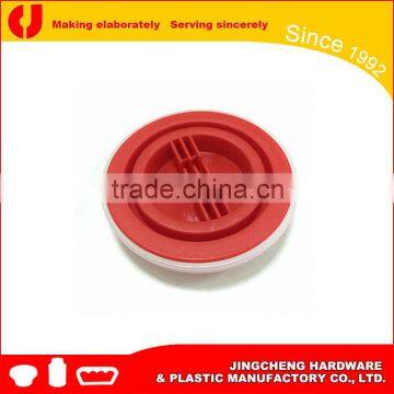 Plastic cap seal for marine fuel oil additive