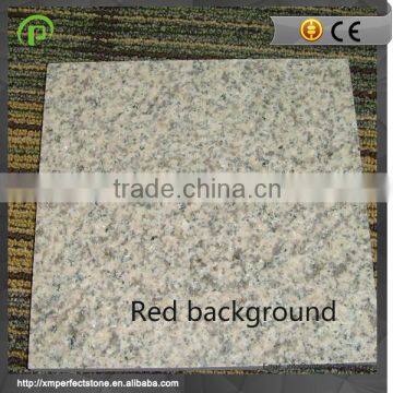 hot sale g655 hazel white granite with red background