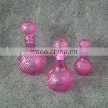 Pink glass perfume bottle