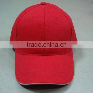 Red heavy brushed cotton baseball cap with brass buckle at back