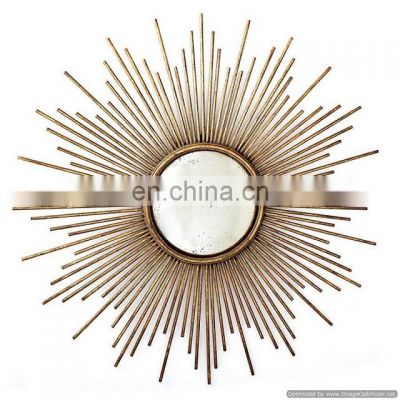 gold color sun design mirror