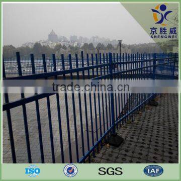 Pressed spear top tubular security fencing