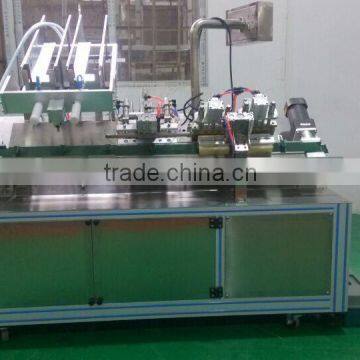 China Guangzhou GMP Standard Double Head Face Mask Making Machine