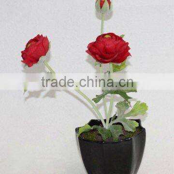 potted artificial red ranunculus