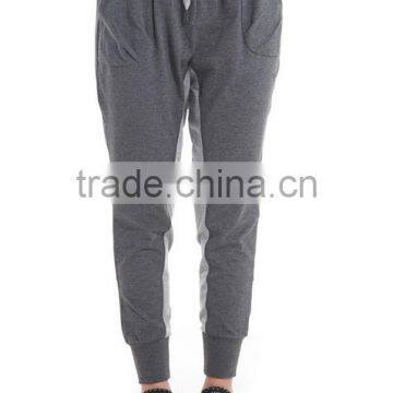 Women deep flowers grey trousers