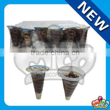 mini chcolate cup with biscuit pieces