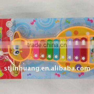 toy of giraffe with plastic xylophone