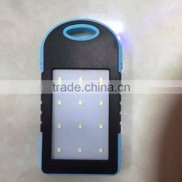Hot selling mobile cell phone solar charger with LED light and flashlight waterproof 5000mah