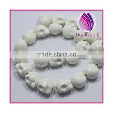 Bead porcelain white 13x11mm skull.