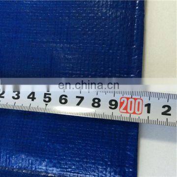 Coated woven tarpaulin