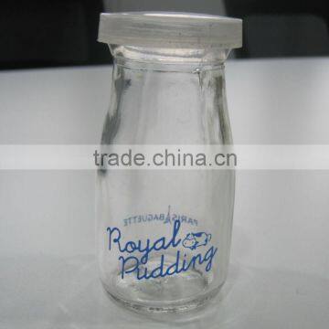 Glass pudding bottle with plastic cap