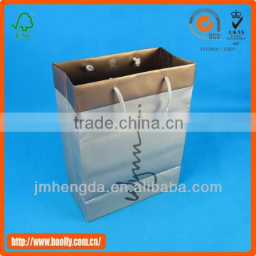 Durable folding luxury paper shopping bag with logo