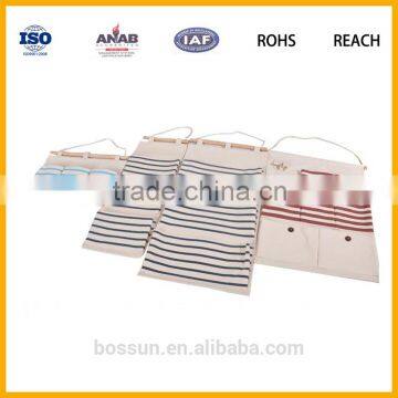 Manufacturing wall hangings bags with pockets for storage