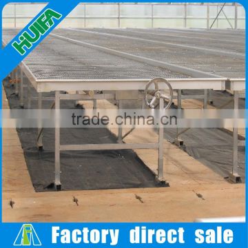 Agricultural movable fixed seed bed greenhouse rolling bench for sale