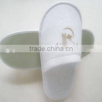 white terry cloth hotel slipper