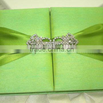 Green Silk Invitation with decorative Brooch