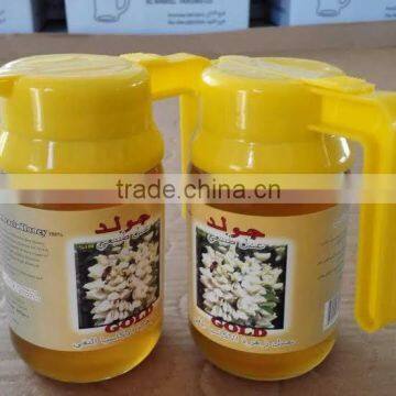 Pure acacia honey in 450g jar with handle