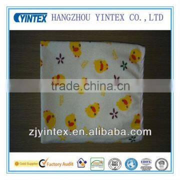 Waterproof print terry cloth crib pad