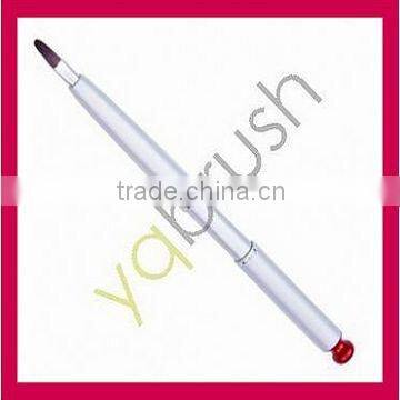 Retractable lip brush