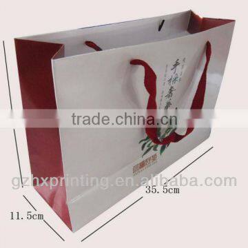 Jumbo paper bag with flat cotton handle