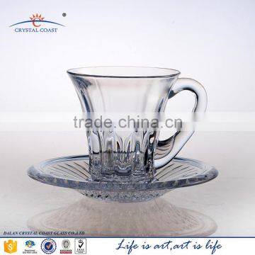 clear glass tea cup with handle