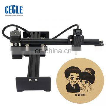 Small Desktop High Precision Cnc Laser Engraving Machine Price photo-2