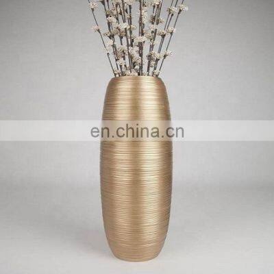 brass color flower vases