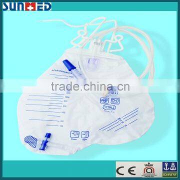 Urine drainage bag with non return valve & sampling port