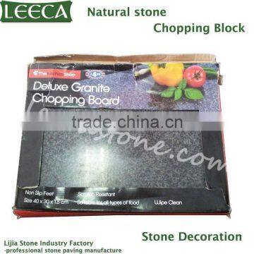 Granite stone chopping board with kitchenware