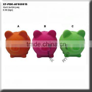 lovely polyresin flocking piggy bank coin counter