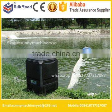 fish farm casting automatic fish feeder in aquaculture