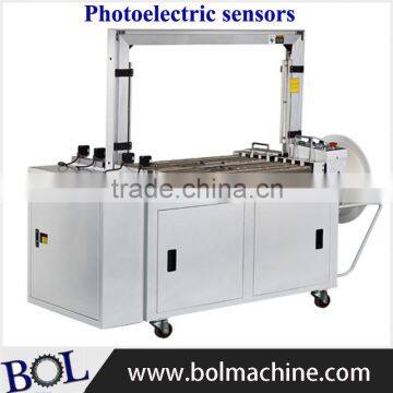 Full automatic carton strapping machines