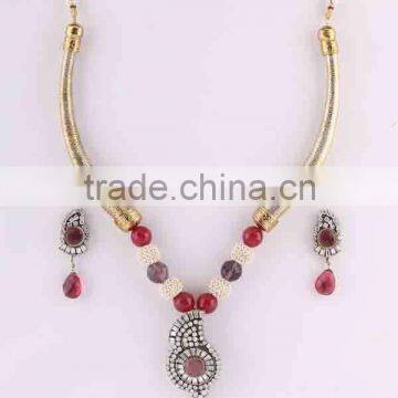 Indian manufacturers ruby and CZ studded necklace set. Indian ethnic style daily wear Jewelry. Brass metal