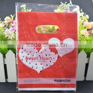 heart printed die cut plastic bag for packing clothes / red custom size shopping bag