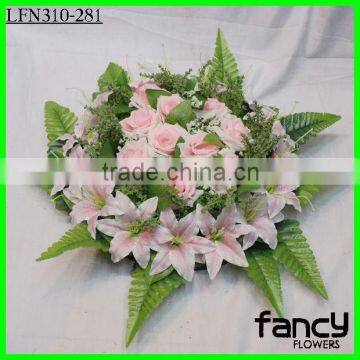 Artificial lily and rose arrangement for wedding table decoration