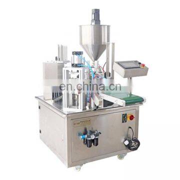 Rotary filling and sealing-cup machine