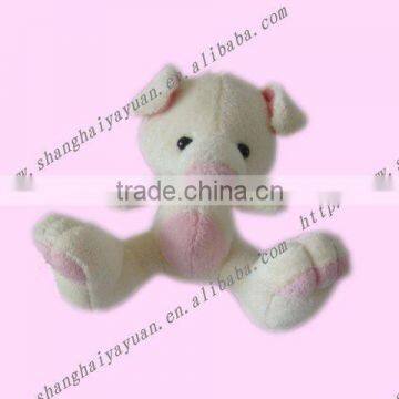 small plush pig toy with big feet