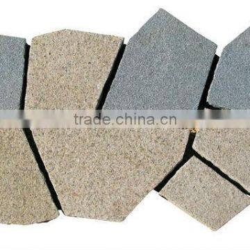 Mesh backed crazy granite paving stone