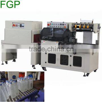 Automatic cutting heat shrink wrapping machine for book or box